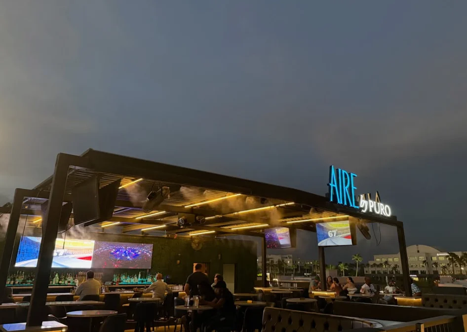 AIRE rooftop lounge glowing at dusk above Downtown Chandler
