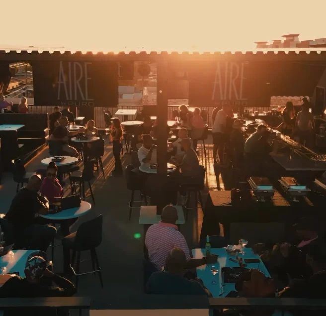 Friends enjoying golden hour at AIRE